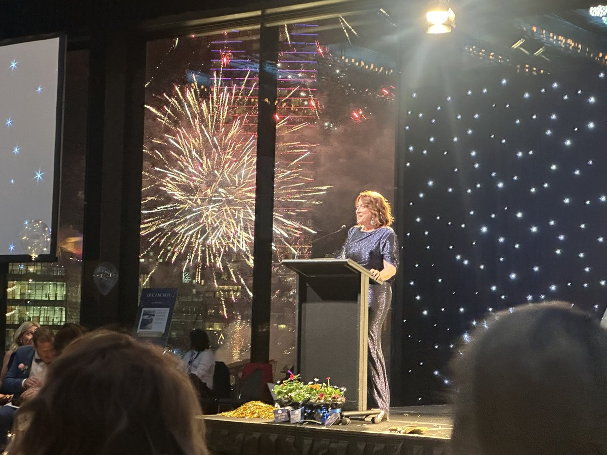 <a href="/batyrAus/">batyr</a> CEO <a href="/ktacheson/">Katie Acheson</a> speaking at the Blue Tie Ball with a full firework display as a backdrop. Great night supporting a great organisation and partner of <a href="/LivingWorksAus/">LivingWorks Australia</a> #safeTALK 
Well done Katie and team!