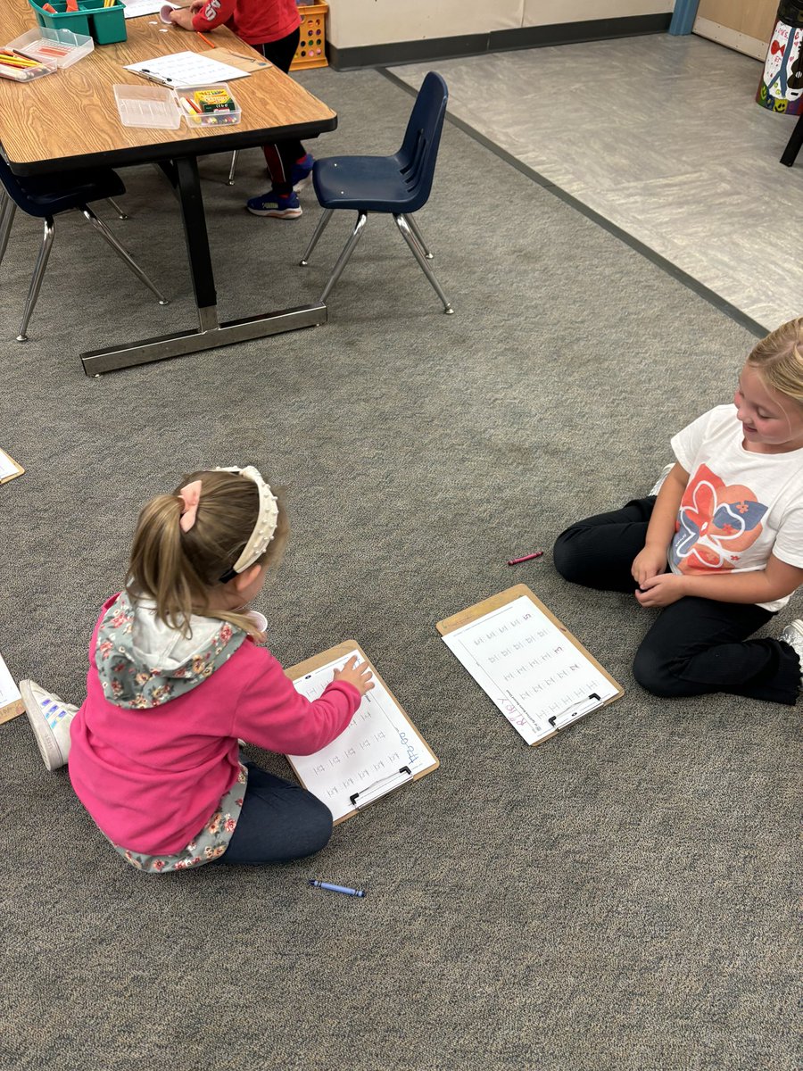 Kinders thinking about combinations to make 5!