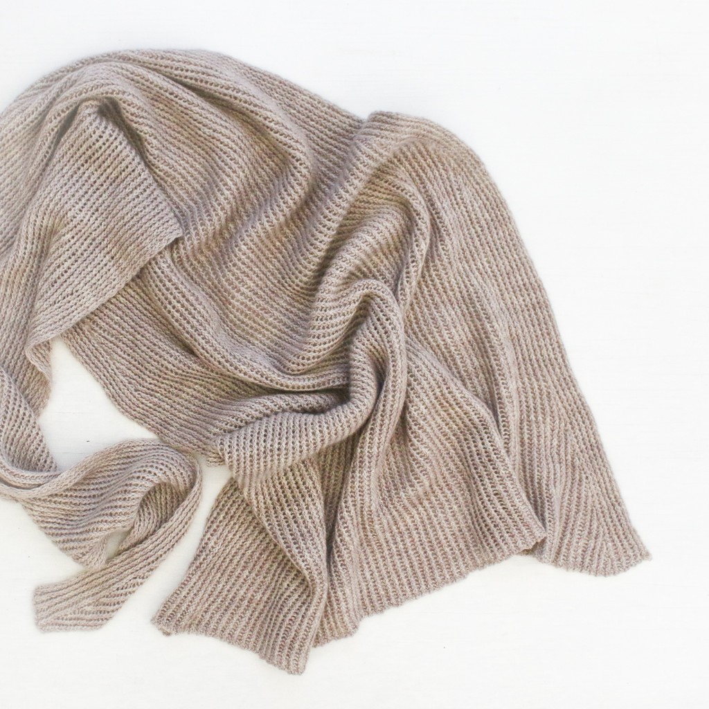 The Peak Hat has a companion accessory, The Peak Shawl.
This simple bias triangle shawl leverages that cushiony twisted rib into a luxurious wrap. Uses 8 skeins Tosh Pebble. Pictured in Antique Lace and offered in lots of striking colors.

madelinetosh.com/collections/to…