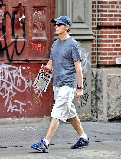 Great picture of David Bowie saying hello to New York City paparazzi.