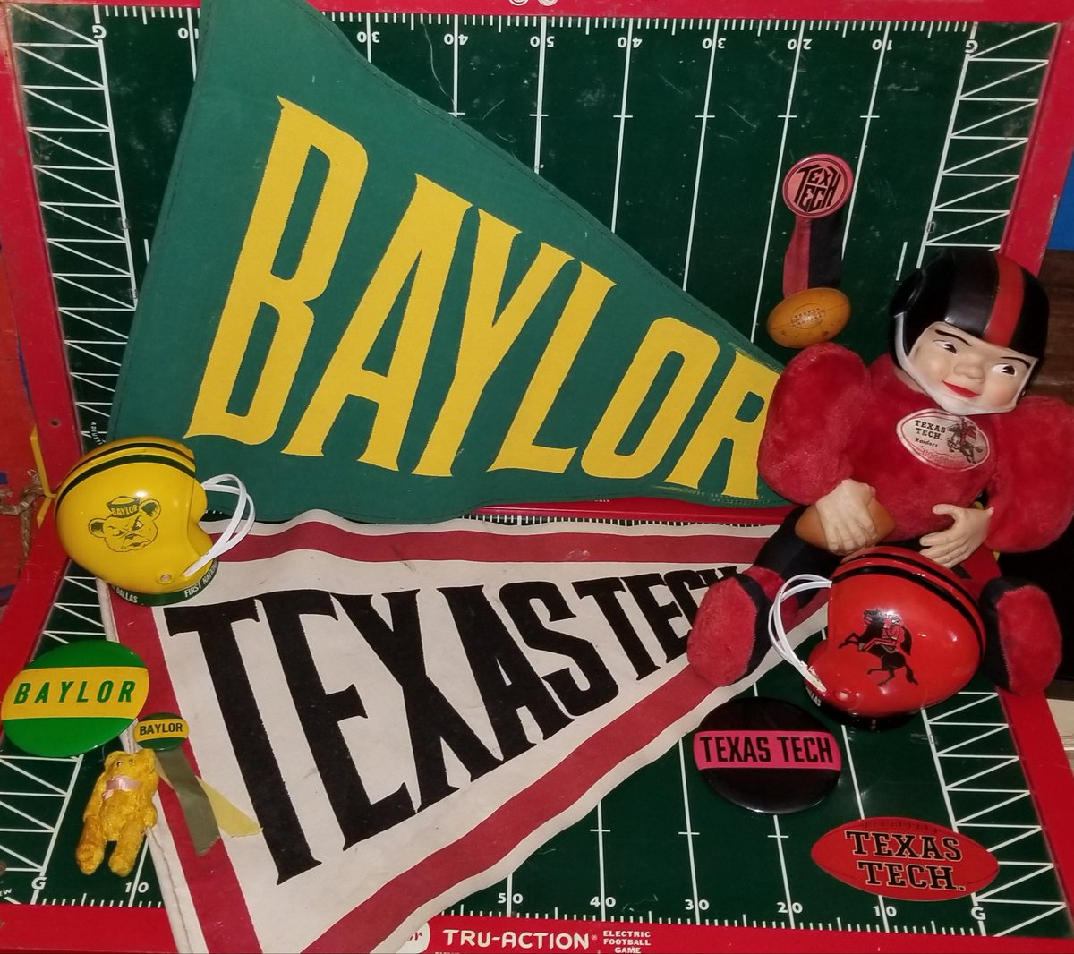 SWCfootballNow's tweet photo. Week 8 #SWCmatchup
@BUFootball at @TexasTechFB
Enco/Esso gas station pennants from two different years, Texas Tech football doll, helmet bank premiums, Enco/Esso water decal, buttons, buttons, and buttons with fuzzy bears and tin footballs. #SWCrivalry #SicEm #WreckEm #SWClivesOn https://t.co/ZVMLj5k6lf
