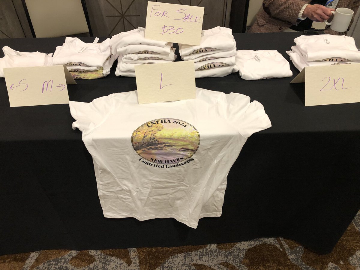 This years t-shirts are for sale in the book room! #cneha2024
