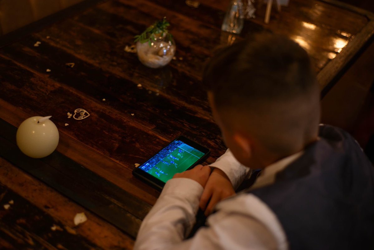 PrincessHelzy's tweet photo. You know it’s love when he’s even watching @NUFC at his uncles wedding. @trippier2 @brunoog97 #toontoon #nufc #blackandwhiteblood #blackandwhitearmy https://t.co/Avp3T580MZ