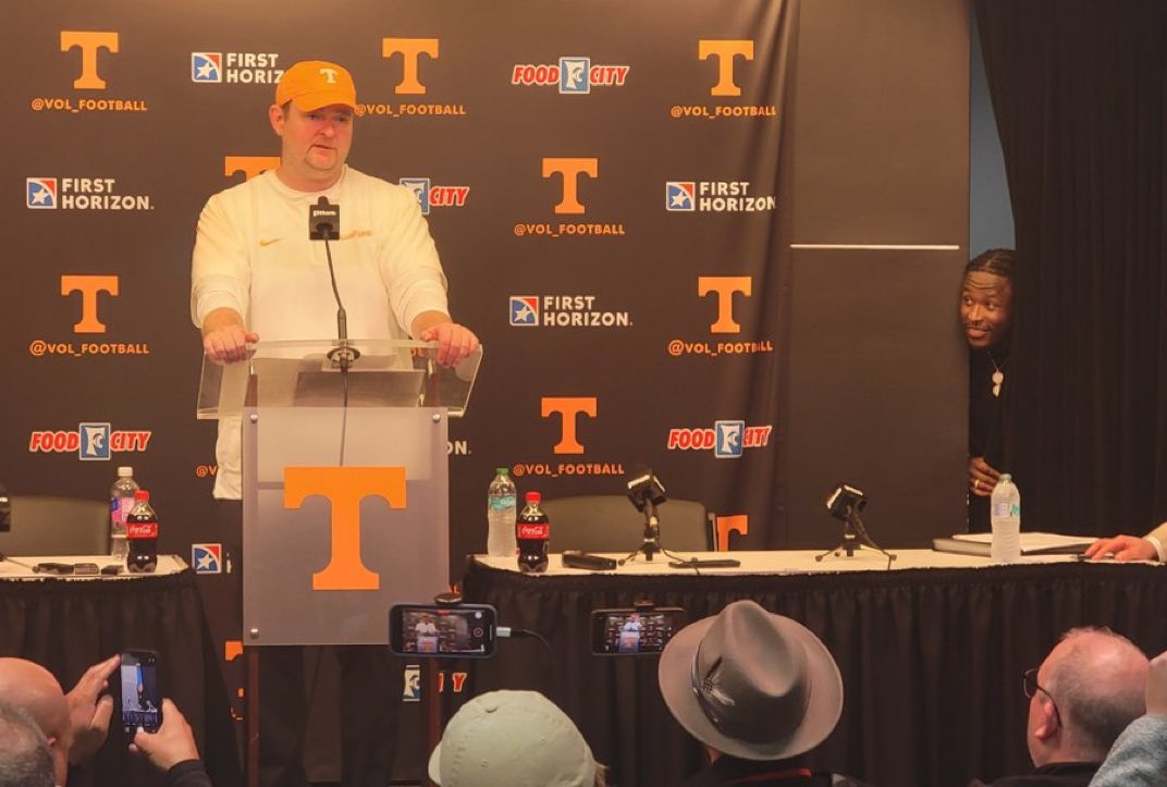 BarstoolTenn's tweet photo. Alvin Kamara sneaks into Josh Heupel’s post-game presser #VFL https://t.co/4S9LUKySja