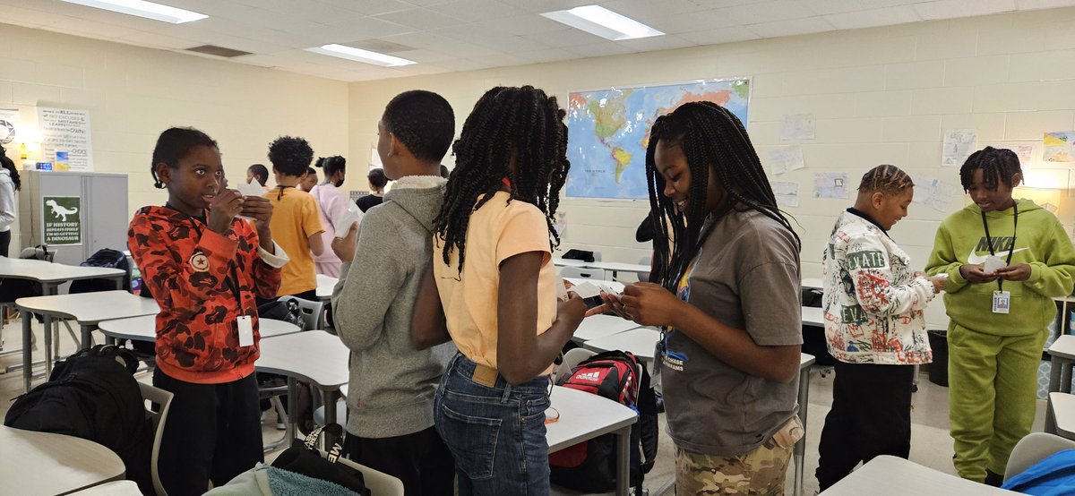 MrsMInman06's tweet photo. Ss participated in a trading simulation to learn about the Silk Road. No one actually got lunch detention but the +5pts coupons were popular! @RichlandTwo @BMSatRSD2 https://t.co/JF0McrWwlc