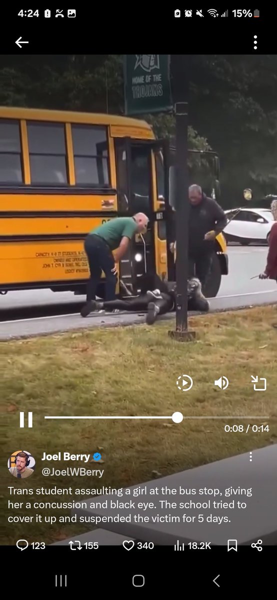 Who is this loser in the green shirt?? Resting his hands as if he's coaching a wrestling match!