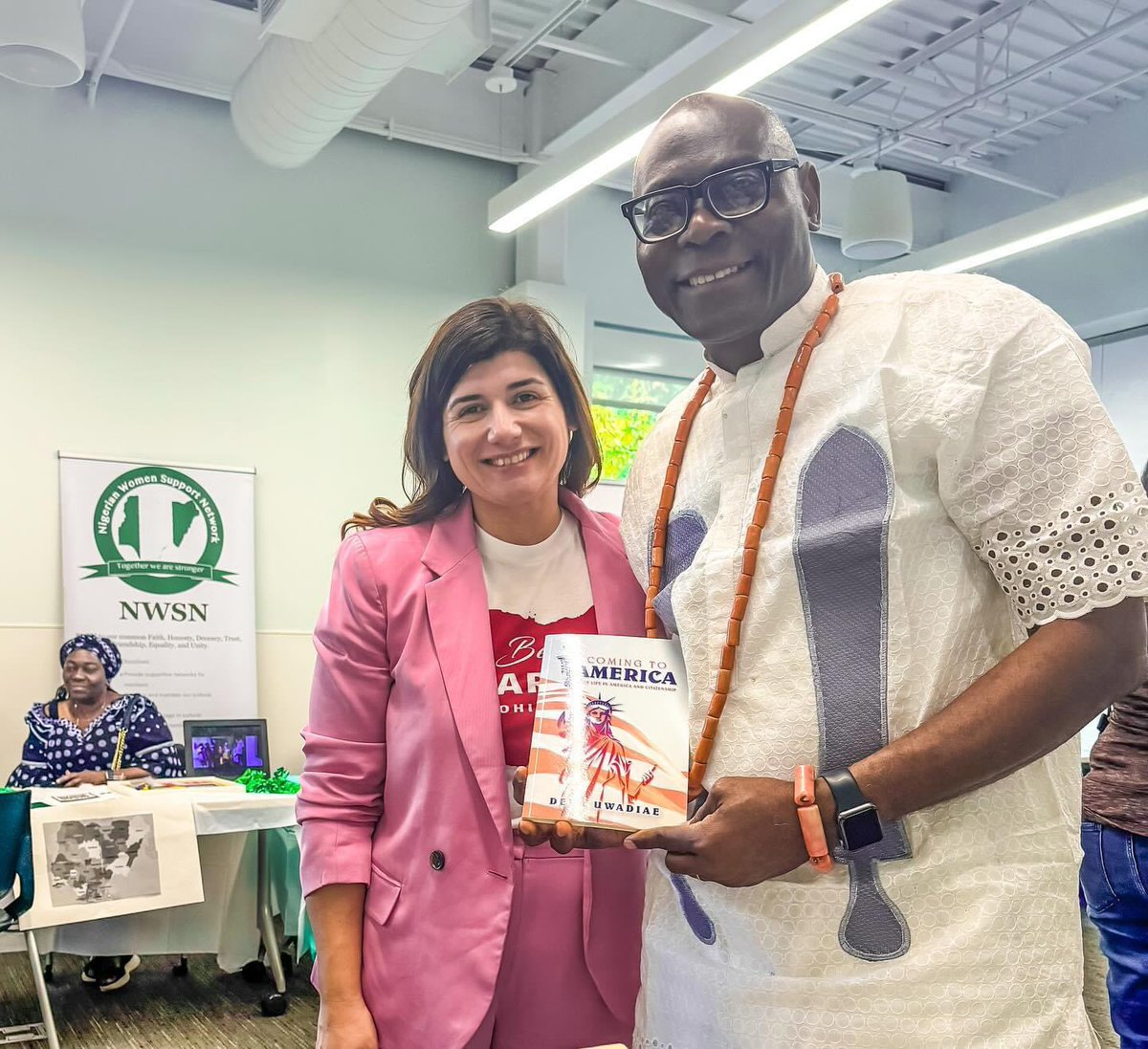 BesaSharrah's tweet photo. Lovely time at the Nigerian Cultural Arts fest. Got my own signed copy of journalist and publishers of New Americans magazine Deba Uwadiae, Coming to America!  #SharrahForOHSenate #OHSenDistrict16 https://t.co/nZ52Zwhpok