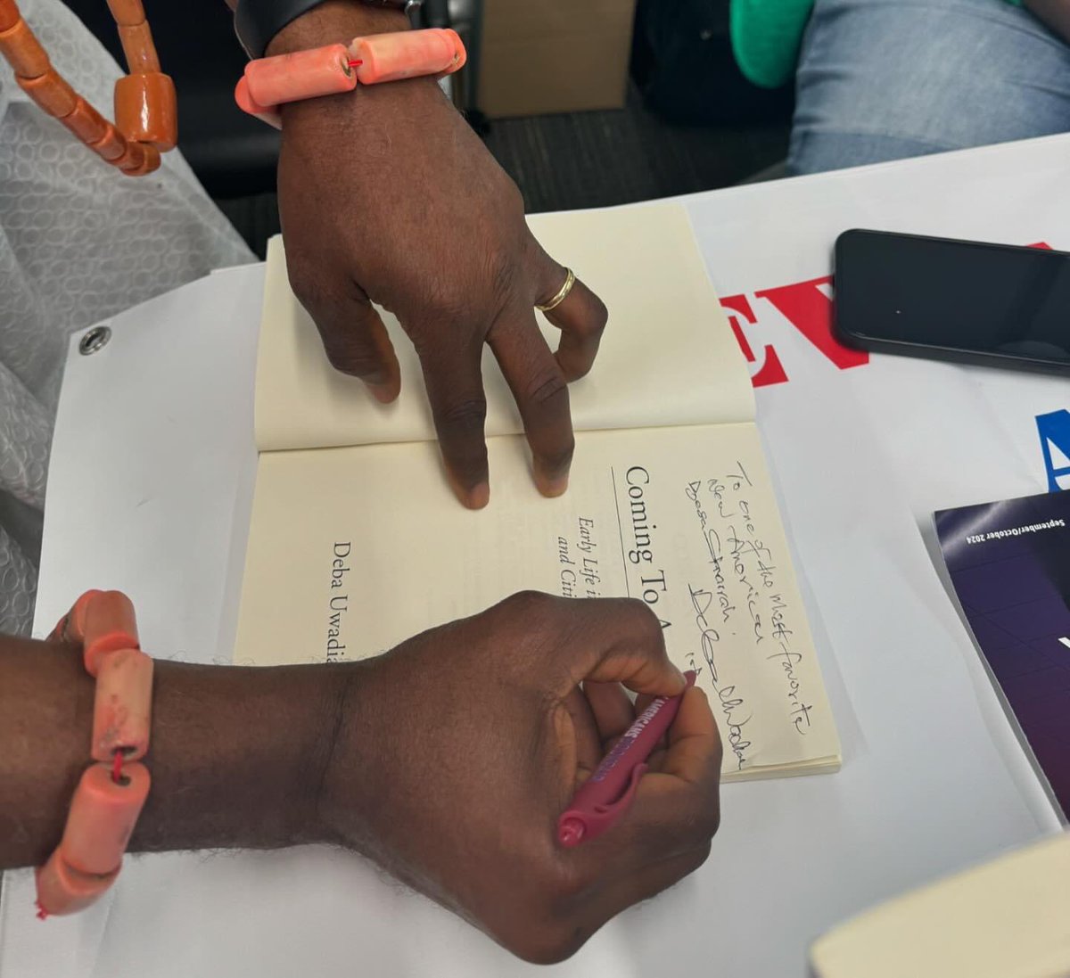 BesaSharrah's tweet photo. Lovely time at the Nigerian Cultural Arts fest. Got my own signed copy of journalist and publishers of New Americans magazine Deba Uwadiae, Coming to America!  #SharrahForOHSenate #OHSenDistrict16 https://t.co/nZ52Zwhpok