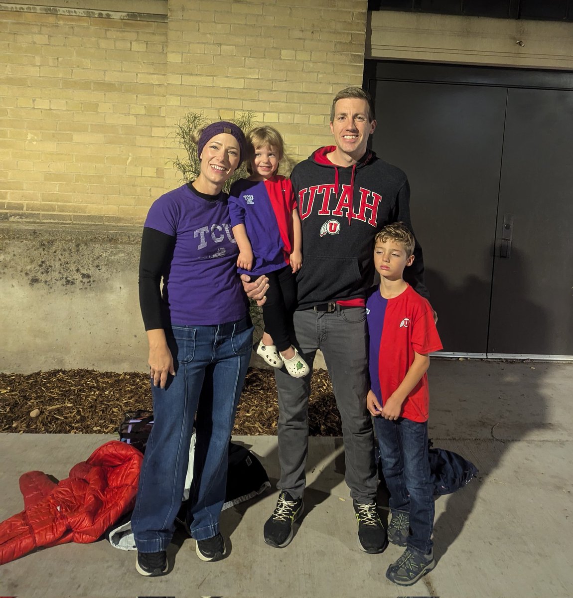RachaelVC's tweet photo. The only time you'll see me wear something other than red at a Utes game! You can tell how excited my son is. #gofrogs #housedivided  #utahfootball https://t.co/sCndVpYOXG