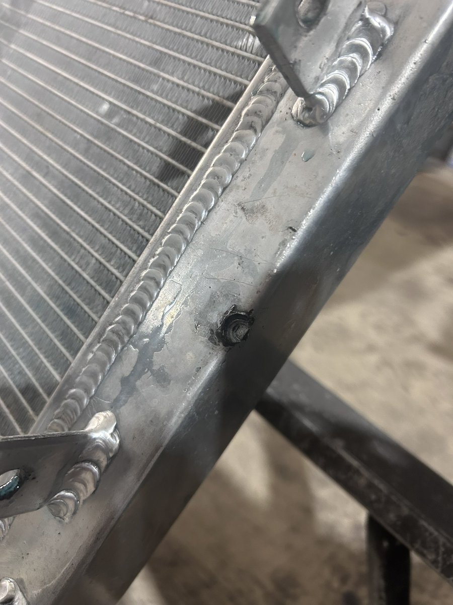 zerovtec's tweet image. perks of living in cleveland. i hit a bump hard as fuck. radiator shifted back and hit the bolt for the t bar