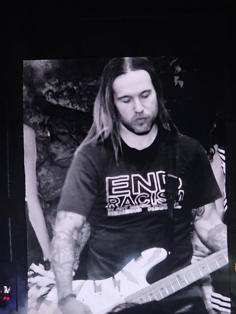 pete wentz in a "end racism" shirt and patrick in a "you dont fuck people over to survive" shirt MY GODDDDD