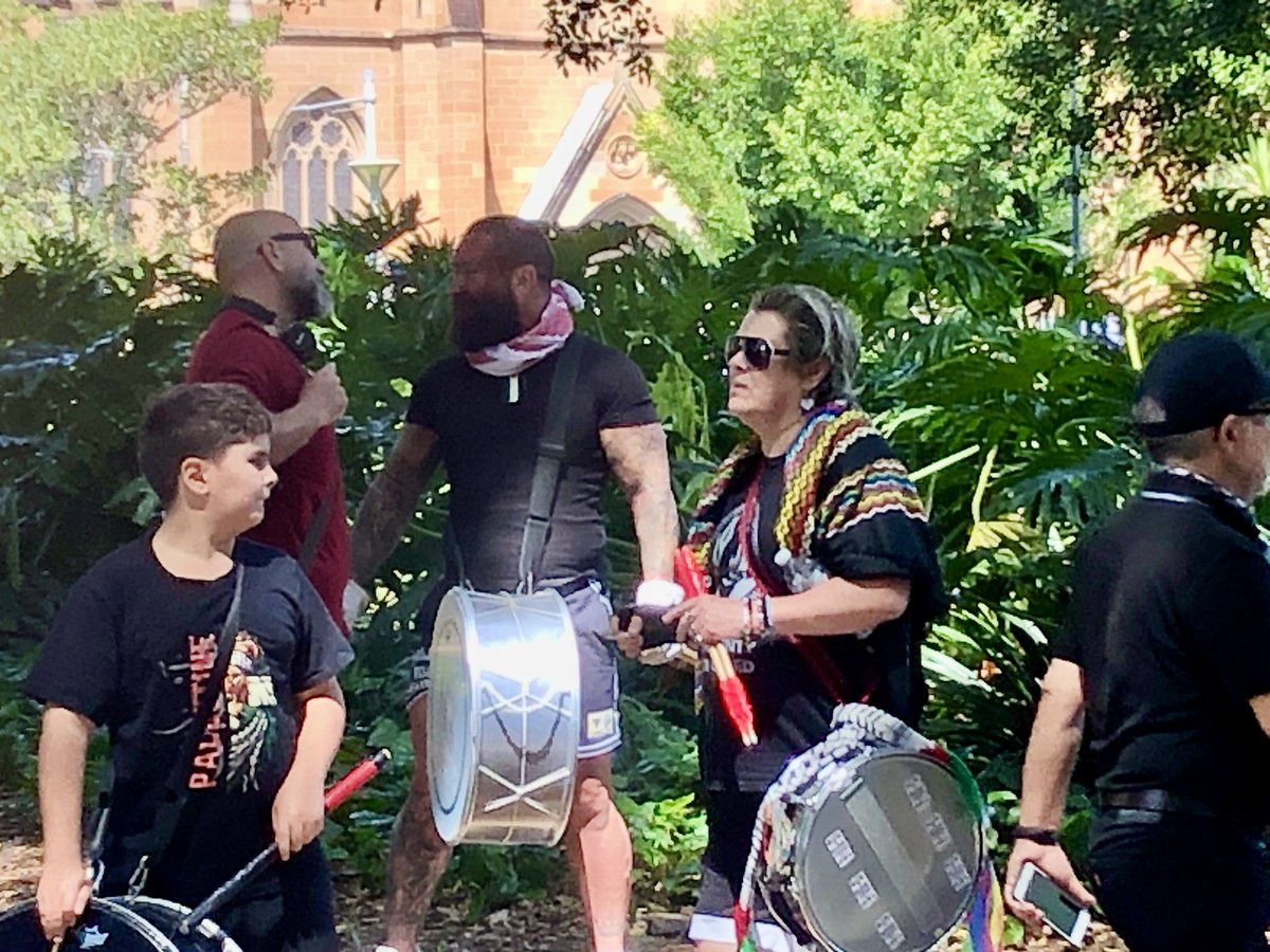 CairnesLinda's tweet photo. #week54 #hydeparksydney #protest #rally We watched the king drive past- he was at State Parliament- we waved our flags. Not so many police- too busy with the king 👑-pics - speeches, police, & the percussion team, Bob, Viv & the bros. https://t.co/WQ2ypkyB25