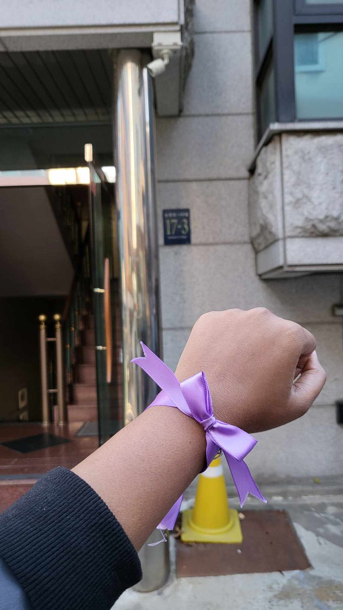 btsbdproject's tweet photo. By tying this purple ribbon, tried to say "We are always with each other to protect BTS and ARMY." The ribbon  represents the endless love of ARMY, which surrounds and protects BTS.
#BTSisSeven
#BangladeshToBangtan https://t.co/FWMksTh1v3