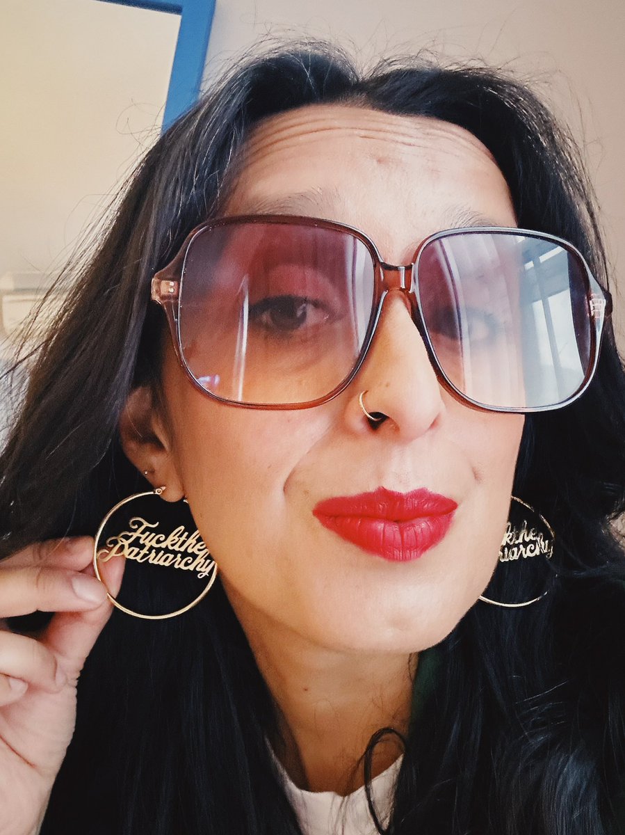 Very on brand earrings for today’s talk on HIV and gender equity at <a href="/QEDcon/">QED</a> #fuckthepatriarchy