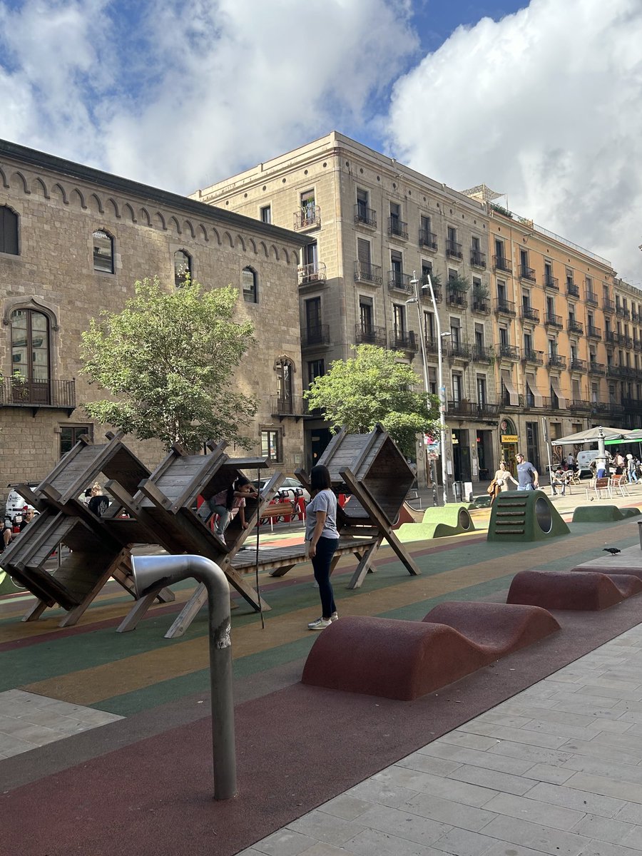 Visiting #Barcelona and love seeing young kids enjoying play spaces integrated into historic and commercial areas! #urban95 #children #cities #parents