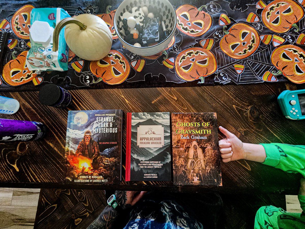 Added 3 new books to the collection this month. My son also wanted to give his approval with the thumbs up 👍 

Can't wait to dive into all these. 🍂🎃🔥📸

<a href="/MrBallen/">MrBallen</a> 
<a href="/DarkPrevails/">Darkness Prevails🎙️</a> 
@zackgraham00