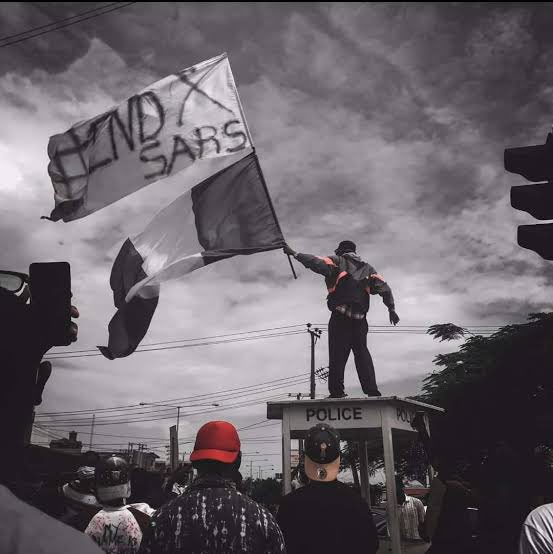 YGMites's tweet photo. Today marks the fourth anniversary of the Lekki Toll Gate shooting and EndSARS protests. @YGMites commemorate the lives lost and the courage of those who protested against police brutality. 
#EndSarsMemorial4 #EndSarsProtests #Oct202020 https://t.co/57KxB2h6na