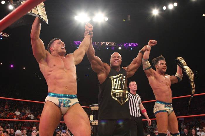 MrPEC_Tacular's tweet photo. 11 years ago today, my brother Robbie E (@MrStoneWWE) &amp; I (The BroMans) won the TNA World Tag Team Titles for the 1st time.

With 7x Mr. OLYMPIA @philheath by our side!

One day we'll reunite (w/@joaquinwilde_!) and history will be made.

#LEGENDS #HouseOfVillains @eentertainment https://t.co/XBMuZPdv77