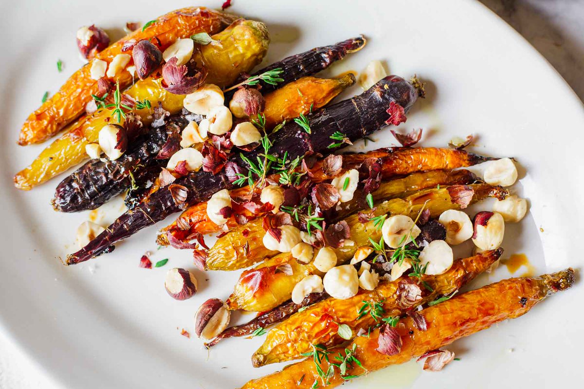 Roasted carrots and hazelnuts - a simple yet elegant side dish that elevates any meal. Check out the full recipe and let me know your thoughts! immigrantstable.com/roasted-carrot…