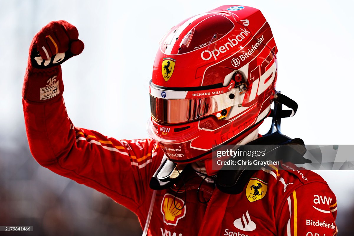 GettySport's tweet photo. Race winner Charles Leclerc of Monaco and Ferrari celebrates on the podium after the F1 Grand Prix of United States at Circuit of The Americas in Austin, Texas. 📸: @BrynLennon - @F1, Peter Fox - F1, @ChrisGraythen, @snapper_thommo #F1 #USGP https://t.co/6XYRyEYj0l