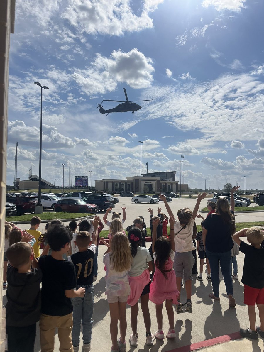 DenuneH's tweet photo. @TISDGOES was able to see the black hawk helicopter land for the patriotic game. The students loved it! https://t.co/O11GSB8Rvh