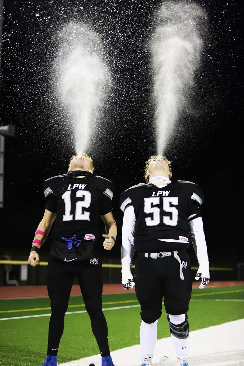 jimbob1426's tweet photo. Picture of my son  Nick #55 and his buddy after there football win.

What a great way to celebrate doing the @TripleH  water spray!! https://t.co/IrMxoDoPJg