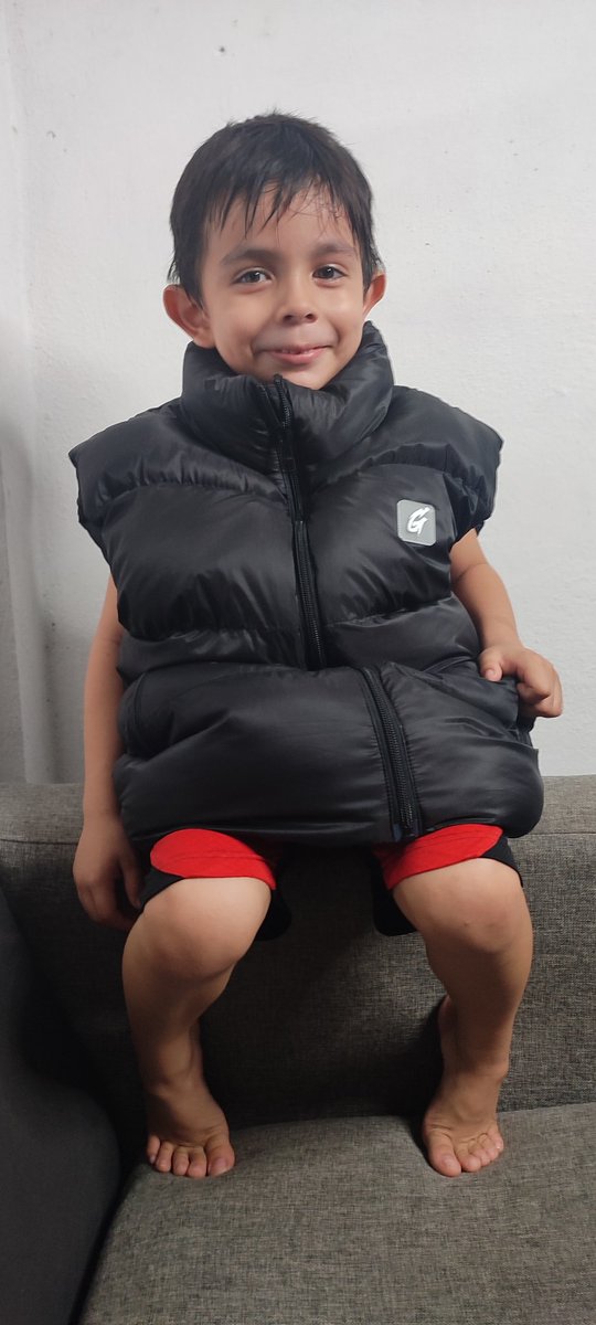 frixburn's tweet image. My black vest from @CyberKongz Genkai arrived, however my son loved it. Will I be able to get you one in your size? 🥰