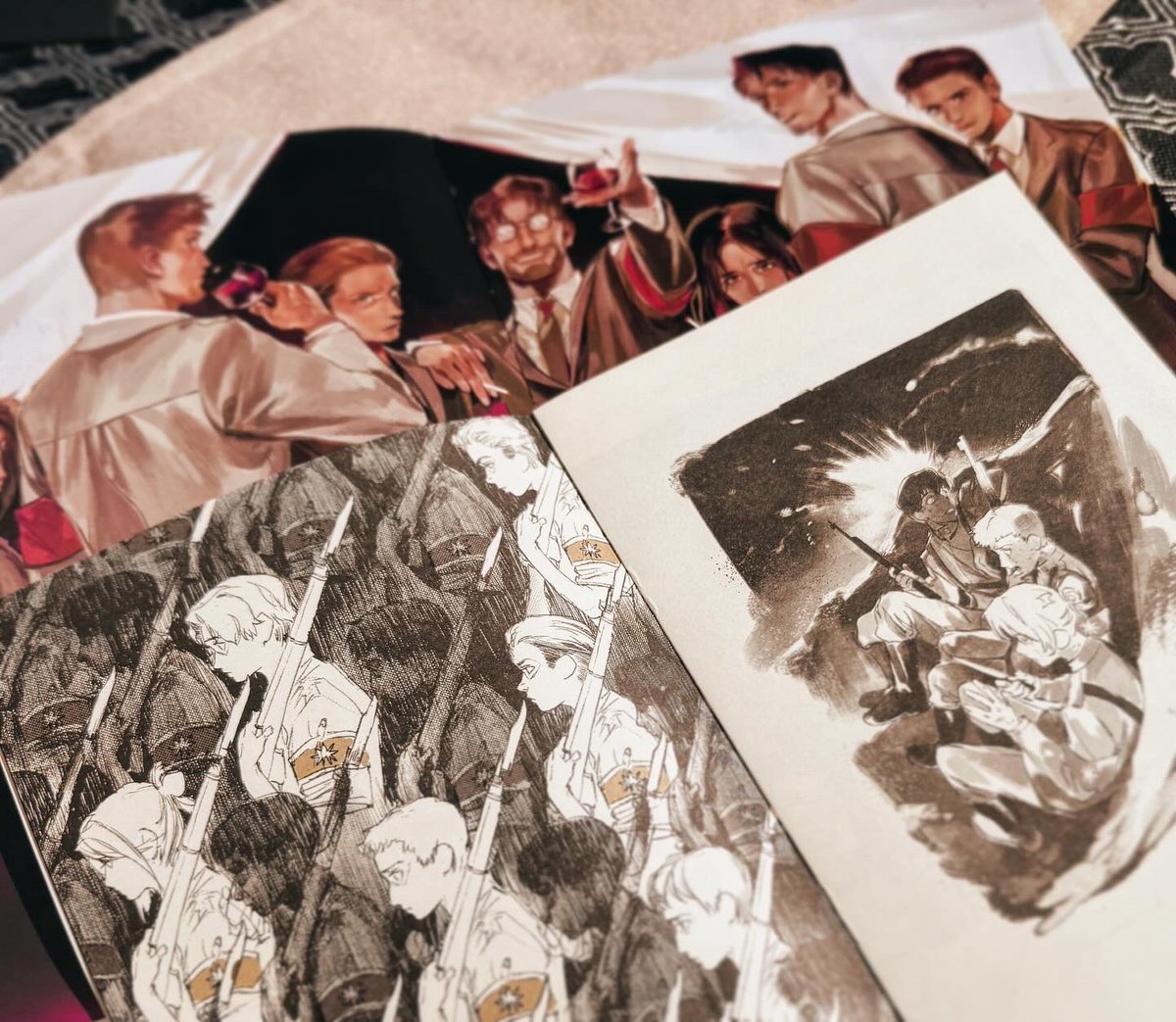 mcmeao's tweet image. Some pictures of my AOT fan book Crimson Ashes, which I will be taking to Lightbox Expo this year 🥹