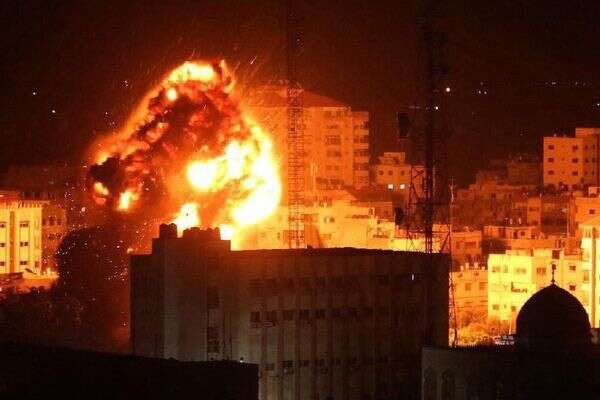 Israel_katz's tweet photo. Beirut in flames. A wide-scale Israeli attack targeted Hezbollah's financial infrastructure in Beirut and across Lebanon last night. Massive fires were seen above Beirut as over 15 buildings were struck following evacuation warnings to residents. Hezbollah has paid and will continue to pay a heavy price for its attacks on northern Israel and its rocket fire. We will keep striking the Iranian proxy until it collapses.