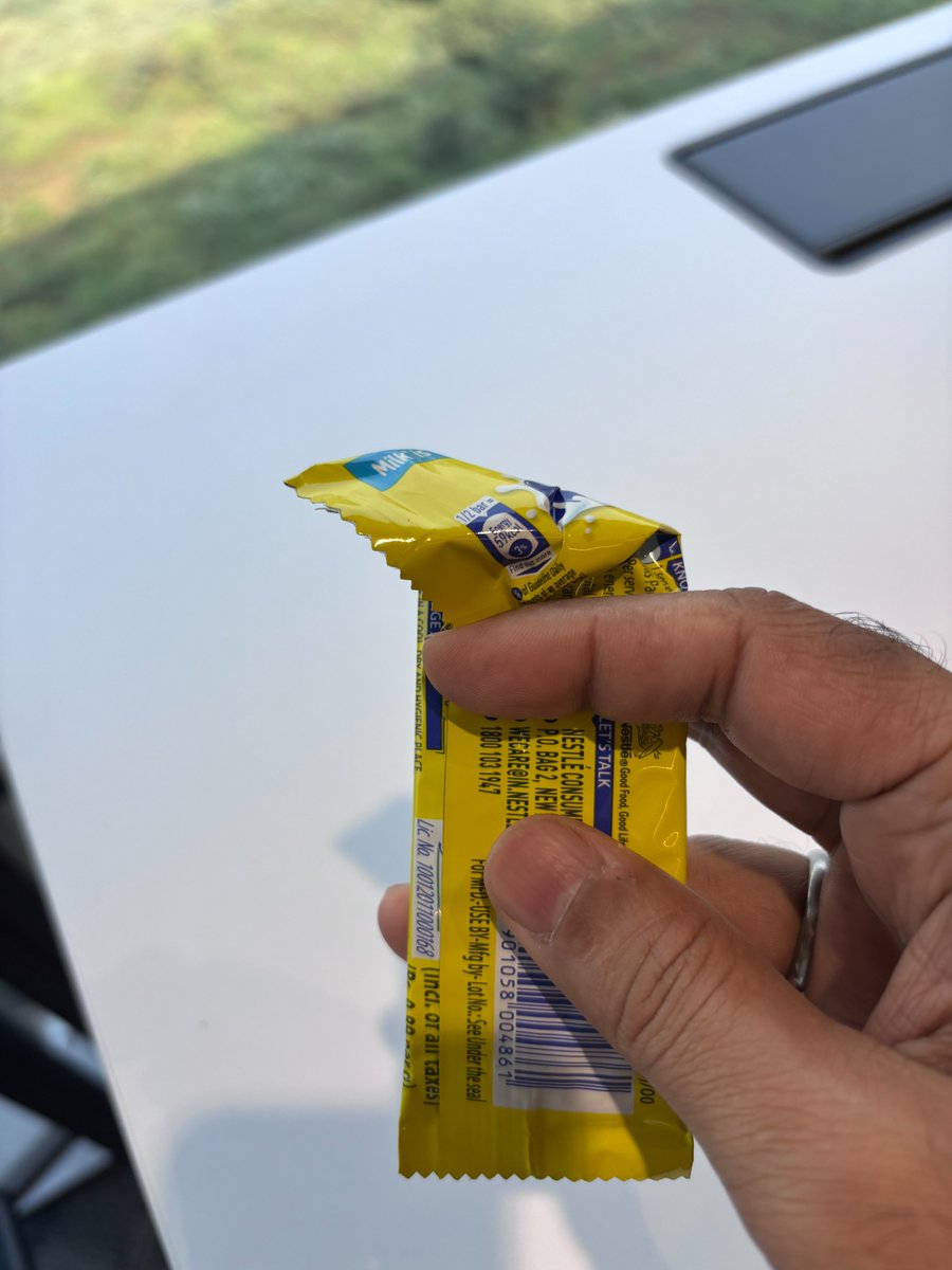 antiquesocial's tweet photo. @NestleIndiaCare Another poor AQI day in Gurgaon. Another poor @Nestle @NestleIndia @NestleIndiaCare quality chocolate. 20% of the chocolate is already missing. https://t.co/sCjh7gUDZw