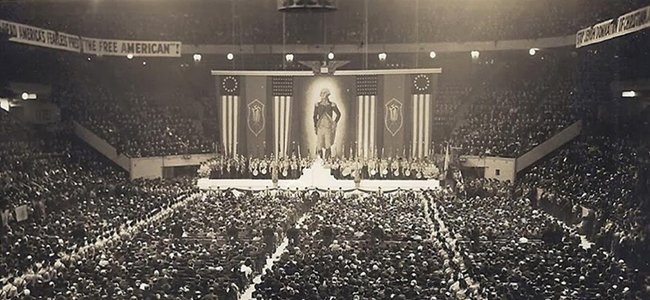 Just because they aren't flying Nazi flags, doesn't mean they're not Nazis. Here is the "pro-America rally" in Madison Square Garden, 1939, where speakers bemoaned Jewish influence in America, especially with Jews "stealing American jobs" and appeals to protect Aryan America.