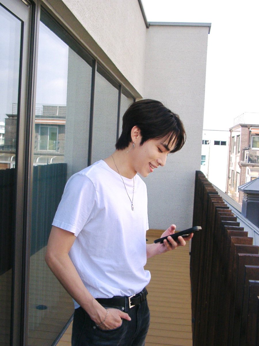 Embracing a simple yet chic style on a great day, rocking a classic white shirt and denim ensemble for that ultimate comfort.