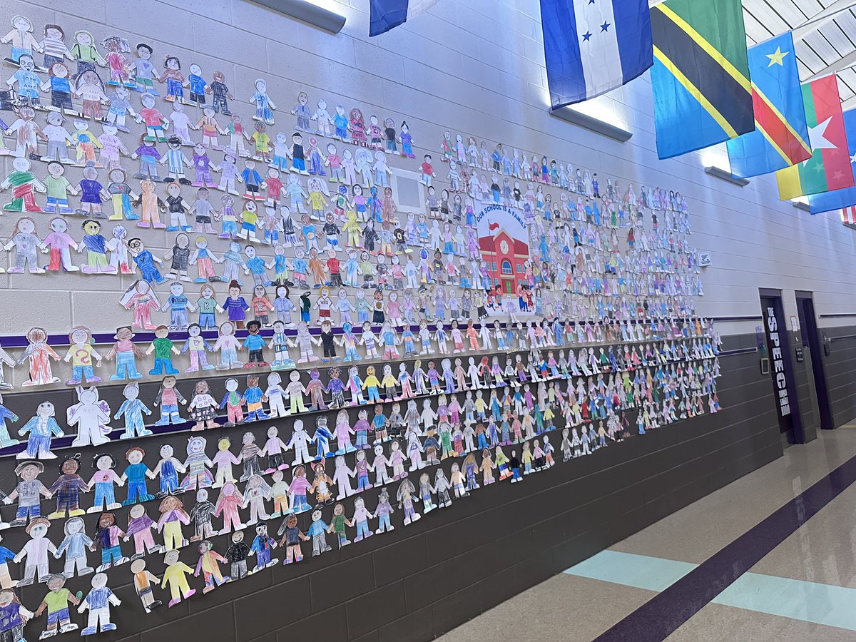 dishmanmcginnis's tweet photo. Our main hallway is our favorite hallway! Every student and staff member is represented on the wall! Fun trying to guess who’s who, and seeing students light up when they find themselves! #dishmanfamily https://t.co/xzWTUAFNxY