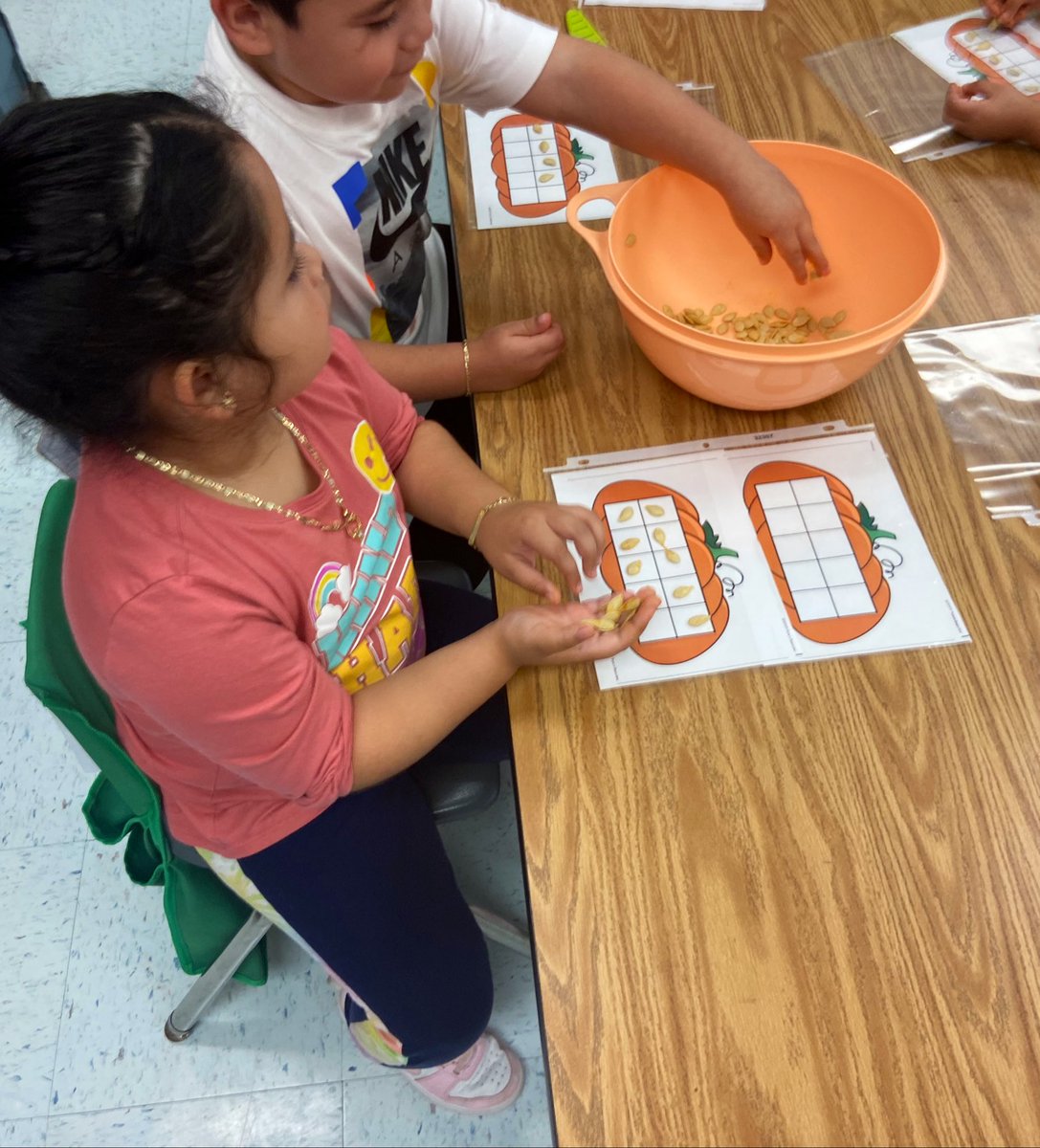 Kindergartners using 10 frames to count pumpkin seeds &amp; build number sense with Ms. Grimes &amp; <a href="/misstroup/">Alea Troup</a> 🎃 <a href="/SugarlandES/">Sugarland Elementary</a>