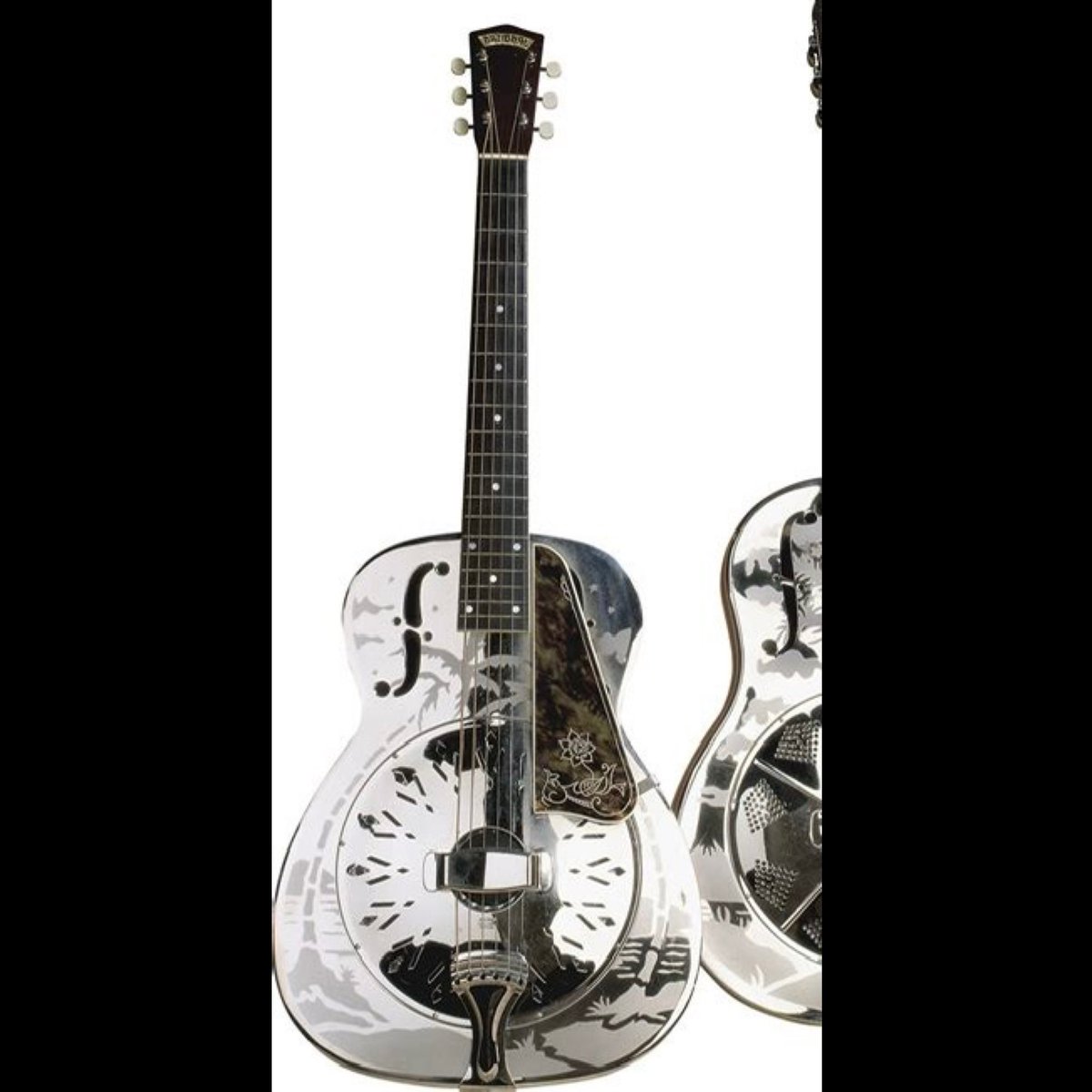 DivebarLiberace's tweet photo. Just put deposit on one like this but with lightning etching instead of tropical scene 👌🏾
It’s the final jewel for my crown 👑
#StyleO #NationalGuitar https://t.co/UIk1pq65Xs