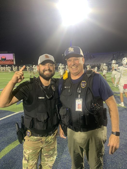 ccspdga's tweet image. Officers Hood and Thomas had a little bet going on for the Creekview vs. River Ridge game Friday night. The officer at the losing school had to wear the spirit wear of the winning school. Officer Hood from Creekview, sported the Knights blue and gold well at the end of the night!
