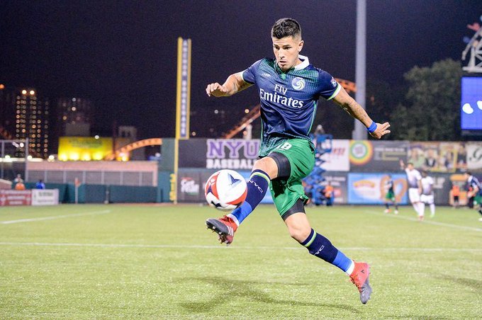 Steve1T's tweet photo. #OnThisDay in 2017 – @LedeManu18 scored 3 times (hat-trick) for @NYCosmos’ 5:2 victory against visiting @PRFootballClub at #MCUPark. @Luckynumber17_ also tallied for hosts as did @cmendes80 who played his final #NASL regular season game w/ #NYCosmos. https://t.co/436Ktwtjm3