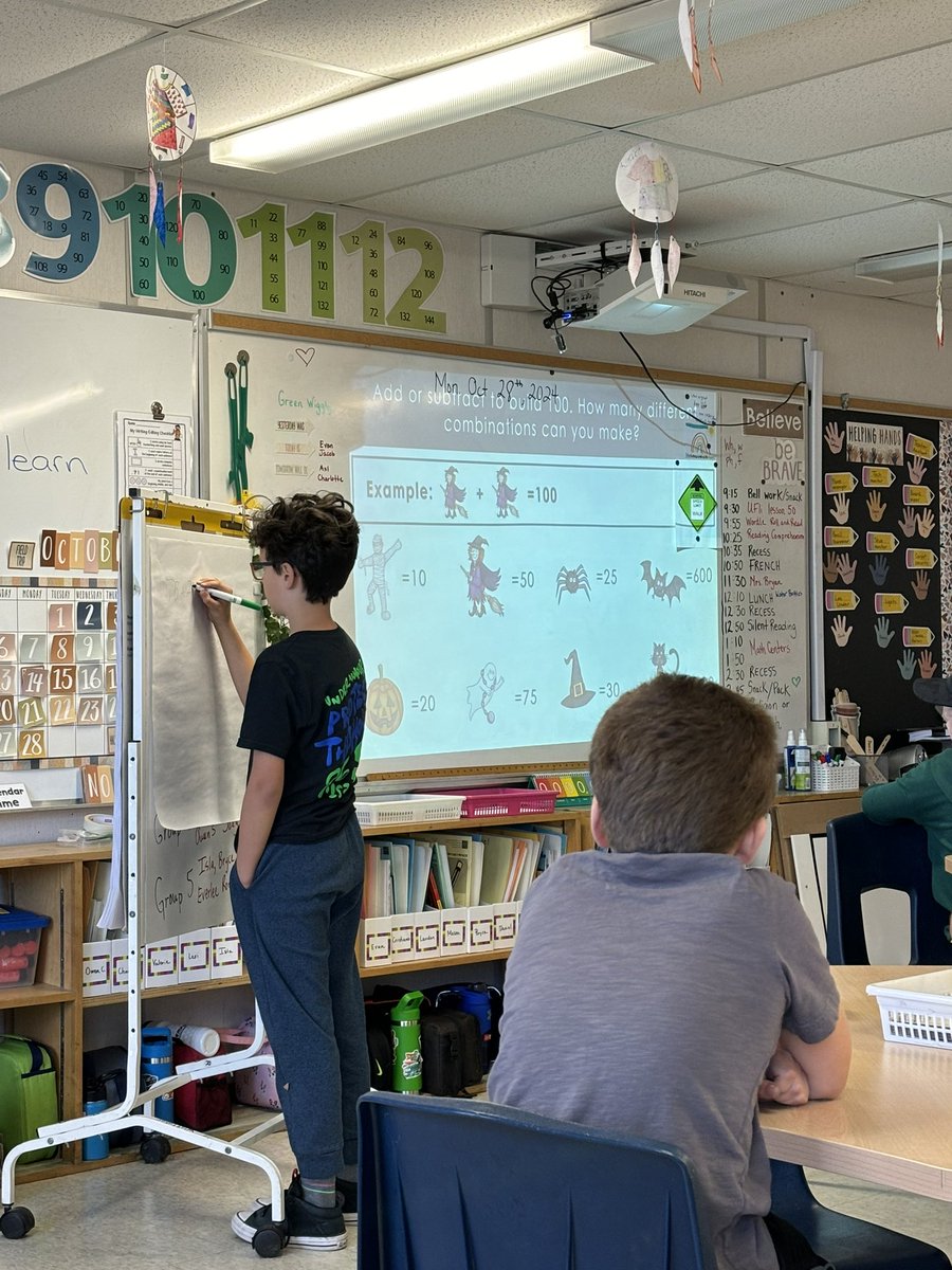 Number talk time in <a href="/Teacheramy75/">Amy Latham</a> ‘s class! Spooky ways to make 100! 👻 #mathfun <a href="/alcdsb/">ALCDSB</a>