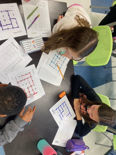 5th graders hard at work, collaborating to solve a spooky riddle using multiplication strategies and graphing with cardinal directions! Watching their teamwork and problem-solving skills soar! #STEM <a href="/PCS_STEM/">PCS_STEM</a>