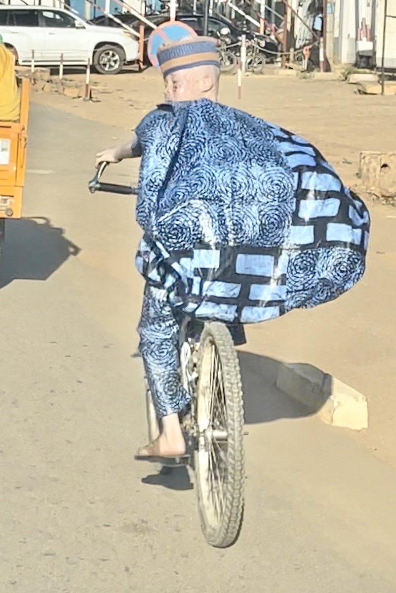 birdson6's tweet photo. "I met a well-dressed young boy on his bike today—he's an #albino. In #Africa, #albinism often means facing discrimination, but I approached him with #love and compassion. What he gave me in return was beyond words”Full story  👉🏼 https://t.co/IOHPu42xIU? https://t.co/qGeu8cvE7X