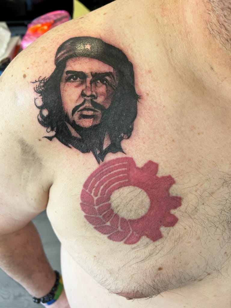 My latest tattoo! (next to the logo of the Communist Party of Canada)