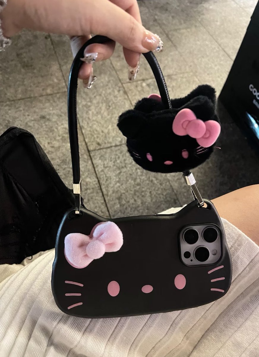piinkimi_'s tweet photo. hello kitty purse phonecase https://t.co/AbJH3l3hx1