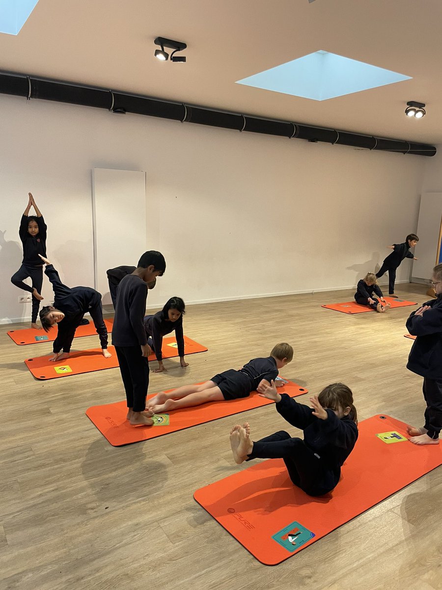 BJAB_PrePrep's tweet photo. What a great start to the week: a yoga class taught by one of our very own students, Marcus! Year 3 loved trying warrior and tree poses and playing musical yoga mats. #BJABYoga #BJABYear3 #BJABWellbeing https://t.co/zMJiZDBxBk