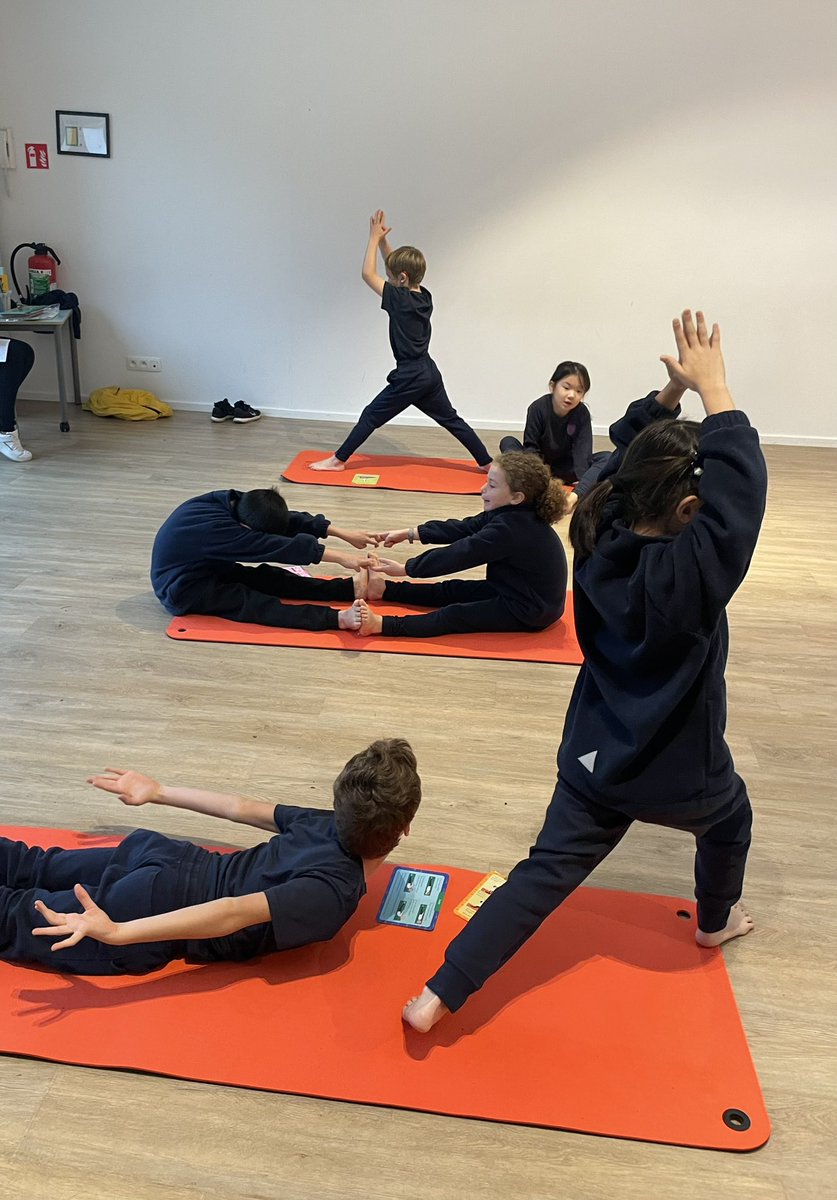 BJAB_PrePrep's tweet photo. What a great start to the week: a yoga class taught by one of our very own students, Marcus! Year 3 loved trying warrior and tree poses and playing musical yoga mats. #BJABYoga #BJABYear3 #BJABWellbeing https://t.co/zMJiZDBxBk