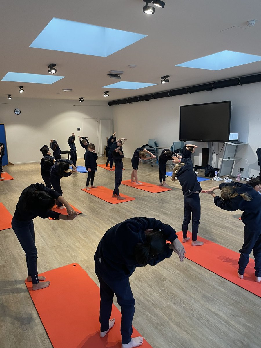 BJAB_PrePrep's tweet photo. What a great start to the week: a yoga class taught by one of our very own students, Marcus! Year 3 loved trying warrior and tree poses and playing musical yoga mats. #BJABYoga #BJABYear3 #BJABWellbeing https://t.co/zMJiZDBxBk