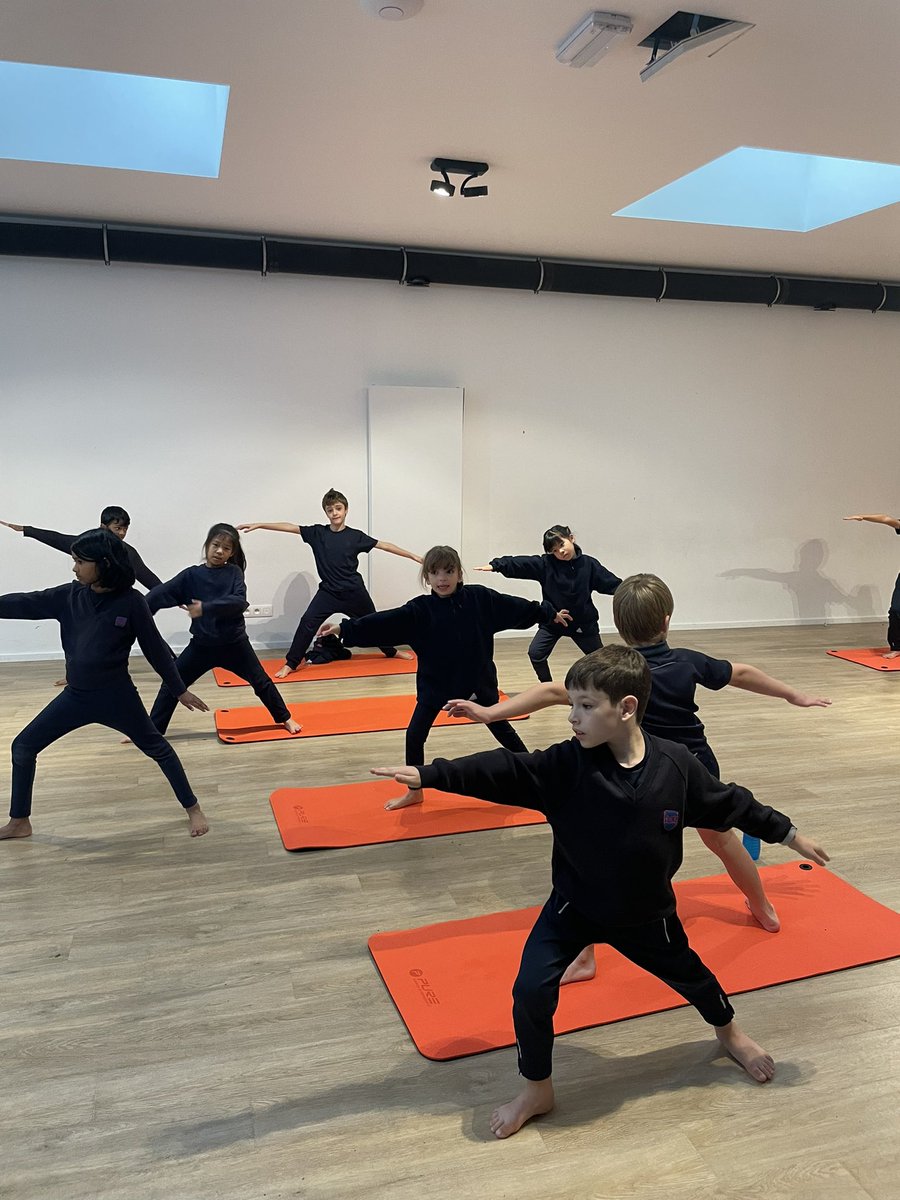 BJAB_PrePrep's tweet photo. What a great start to the week: a yoga class taught by one of our very own students, Marcus! Year 3 loved trying warrior and tree poses and playing musical yoga mats. #BJABYoga #BJABYear3 #BJABWellbeing https://t.co/zMJiZDBxBk