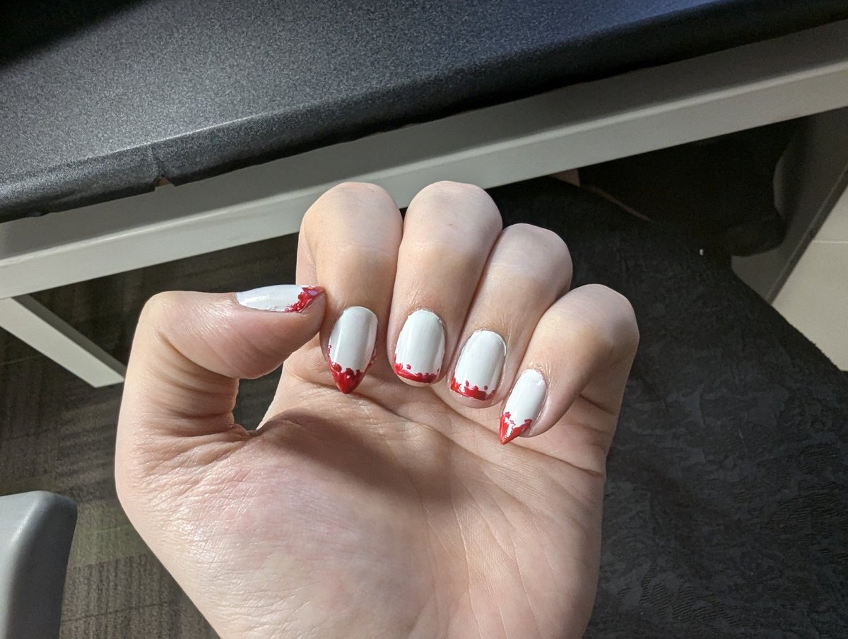 Did my nails for Halloween, not thinking about how hard they're going to make this upcoming game jam.