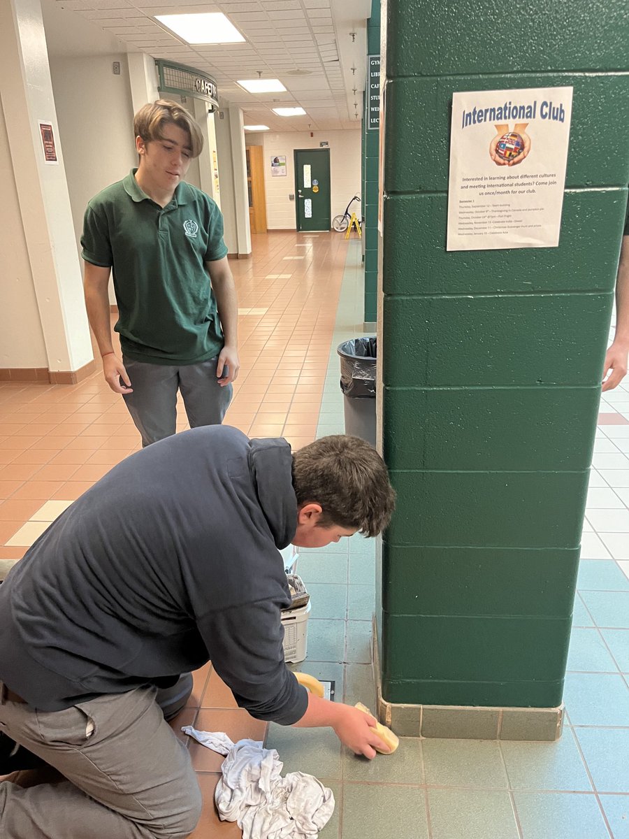 terrianndaniel's tweet image. Mr. Healey’s students learning to grout and making improvements around our school - how cool is that?   Real world skills