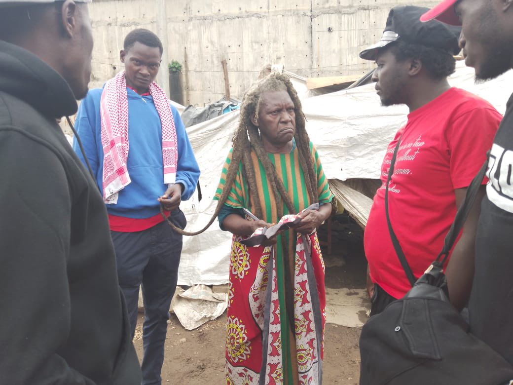 CommunistsKe's tweet photo. #MashujaaWetu are living in abject poverty, while this criminal government splashed money in Kwale. CPK comrades spent #MashujaaDay2024 visiting Mau Mau women still living in shackles in Mathare. We must raise the flag high for our true heroes, not those traitors. https://t.co/WMuWGxZJJt