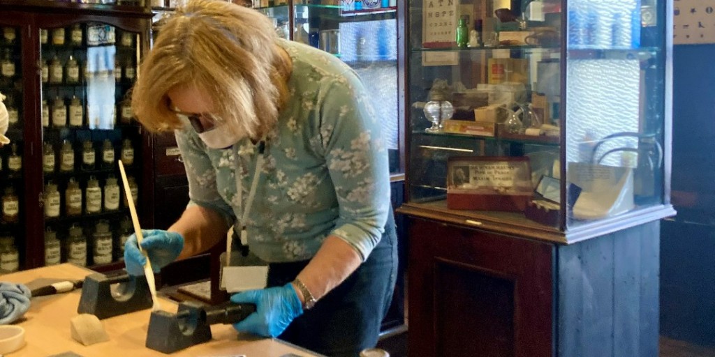 Over the next few weeks, you might spy our Conservator Dave and his band of volunteers, deep cleaning our recreated chemist shop. 
With over 2000 items in the collection, this is an EPIC task. In all we estimate they will work on this for 56 hours. Thank you to the little crew!